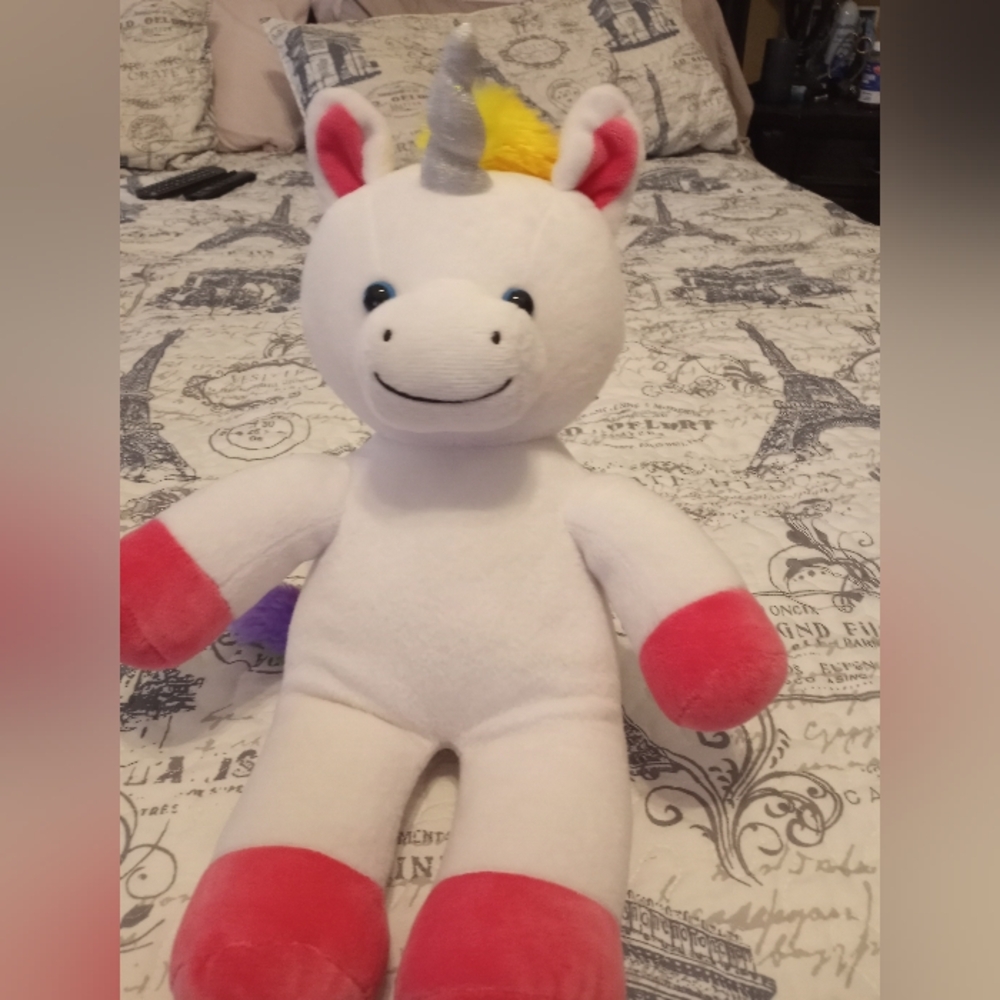 Plush Unicorn Toy with Pink Accents